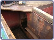 Holes in pontoon bulkhead revealed: will require plating